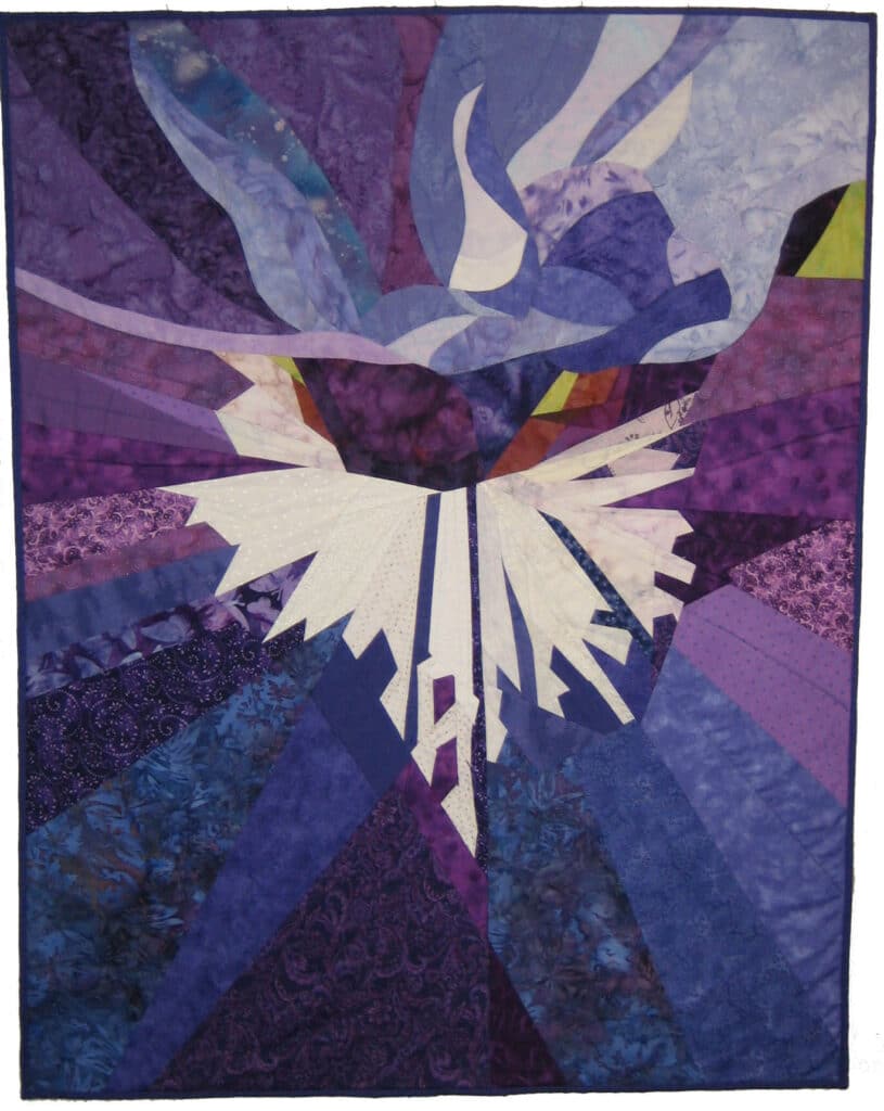 quilt created from close up of purple iris flower