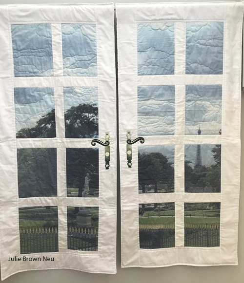 wall quilt with photos of Paris and white sashing