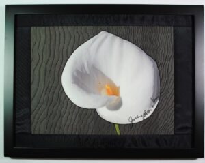 calla lily on black background thread painting